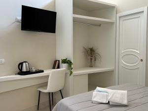 Katil atau katil-katil dalam bilik di Pompei via Roma Suite