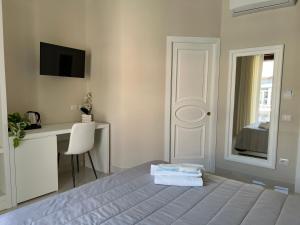 Katil atau katil-katil dalam bilik di Pompei via Roma Suite