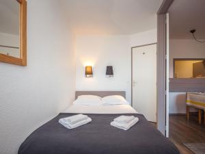 Posteľ alebo postele v izbe v ubytovaní Appartement rénové avec parking et wifi à Chamonix - FR-1-343-208