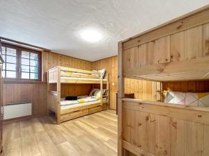 Voodi või voodid majutusasutuse Chalet le Basset - Keys to Paradise in the Alps toas