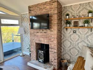 Μια τηλεόραση ή/και κέντρο ψυχαγωγίας στο Brackenrigg Lodge