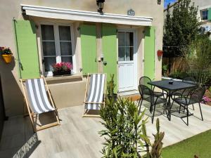 Vonkajšia záhrada v ubytovaní Maison dans une résidence de vacances