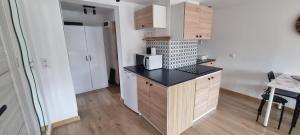 Kuchyň nebo kuchyňský kout v ubytování Apartament Przystań