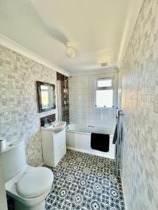 Ένα μπάνιο στο Brackenrigg Lodge