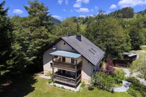 an aerial view of a house with a balcony at Ferienwohnung Karawankenblick in Bach