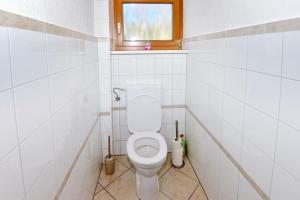 A bathroom at Ferienwohnung Karawankenblick Még 24 kép