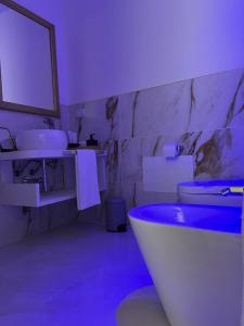 Et badeværelse på Pompei via Roma Suite