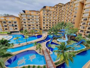 an aerial view of the resort pools and slides at Gold Coast Morib Resort By Sweetime in Kampong Tanjong Pechah