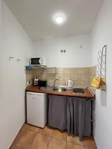 Kuchyňa alebo kuchynka v ubytovaní Apartamentos Villa Torcal
