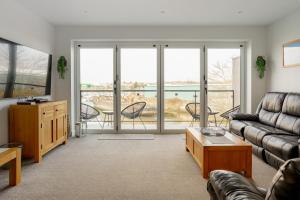 Un lugar para sentarse en Large Modern Scenic 4 Bedroom Townhouse