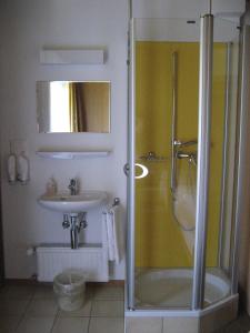 Koupelna v ubytování Hotel Garni Simplon