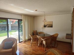 Ein Sitzbereich in der Unterkunft Elegant and Peaceful Aparments with Pool and Garden