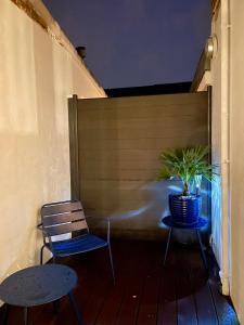 Część wypoczynkowa w obiekcie Escale bohème - Terrasse en centre-ville - Gare