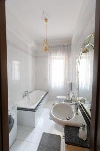 Koupelna v ubytování Casa Vacanze Kennedy + 22 fotografií
