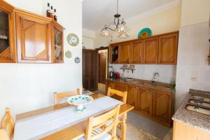 Kuchyň nebo kuchyňský kout v ubytování Casa Vacanze Kennedy