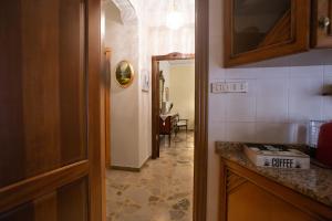 Kuchyň nebo kuchyňský kout v ubytování Casa Vacanze Kennedy