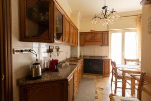 Kuchyň nebo kuchyňský kout v ubytování Casa Vacanze Kennedy
