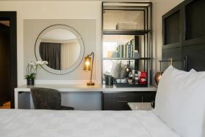 Postel nebo postele na pokoji v ubytování Hotel Hartness
