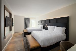 Postel nebo postele na pokoji v ubytování Hotel Hartness