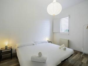 Posteľ alebo postele v izbe v ubytovaní Casa Mediterránea en Badalona