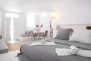 Postel nebo postele na pokoji v ubytování myMykonos Guest House