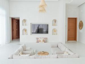 Uma área de estar em Pool Villa Jebel Jais