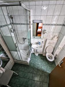 Koupelna v ubytování Hotel am Rathaus