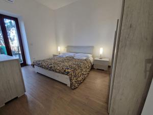 Postel nebo postele na pokoji v ubytování Villa Lante Viterbo Apartment