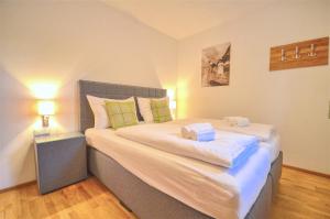 Posteľ alebo postele v izbe v ubytovaní Apartment Konstanzia - by Alpen Apartments