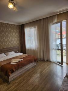A bed or beds in a room at MOON NIGHT