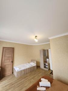 A bed or beds in a room at MOON NIGHT