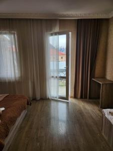 A bed or beds in a room at MOON NIGHT