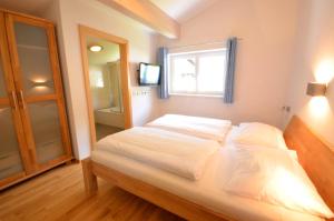 Katil atau katil-katil dalam bilik di Penthouse Cooper - by Alpen Apartments