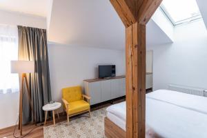 Letto o letti in una camera di Hotel Restovna