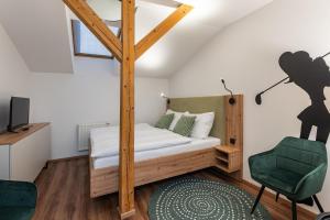 Letto o letti in una camera di Hotel Restovna