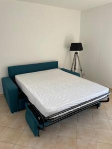Posteľ alebo postele v izbe v ubytovaní Appartement cosy proche du centre