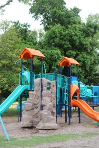 a group of playground equipment in a park at Sun Outdoors Cape May in Cape May