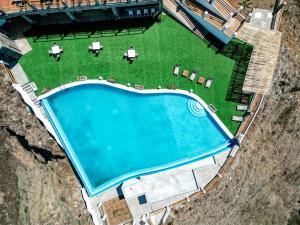 Bazén v ubytování RM Green Hotel nebo v jeho okolí