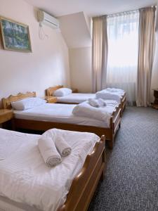 Postel nebo postele na pokoji v ubytování SameТой