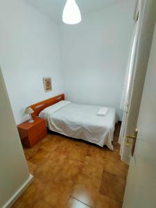 Ένα ή περισσότερα κρεβάτια σε δωμάτιο στο Acogedora casa de pueblo