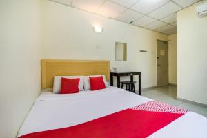 Postel nebo postele na pokoji v ubytování Hotel River Inn