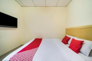 Postel nebo postele na pokoji v ubytování Hotel River Inn