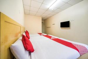 Postel nebo postele na pokoji v ubytování Hotel River Inn