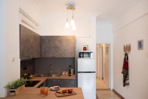 Kuchyňa alebo kuchynka v ubytovaní Blue Ark Boho Stay at Acropolis
