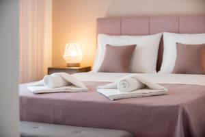 Posteľ alebo postele v izbe v ubytovaní Blue Ark Boho Stay at Acropolis
