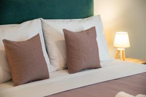 Posteľ alebo postele v izbe v ubytovaní Blue Ark Boho Stay at Acropolis