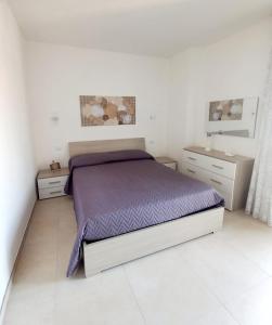 Un pat sau paturi într-o cameră la Civico 26 T