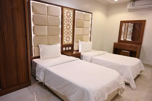 Photo de la galerie de l'établissement Liwan Alkhaleej for serviced apartments ليوان الخليج للشقق المخدومة, à Riyad 25 autres photos