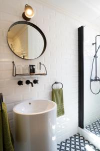 Um banheiro em Hotel da Oliveira