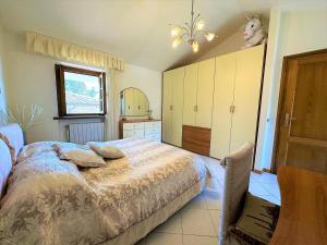 Voodi või voodid majutusasutuse Villetta La Panoramica by Nicola Real Estate toas